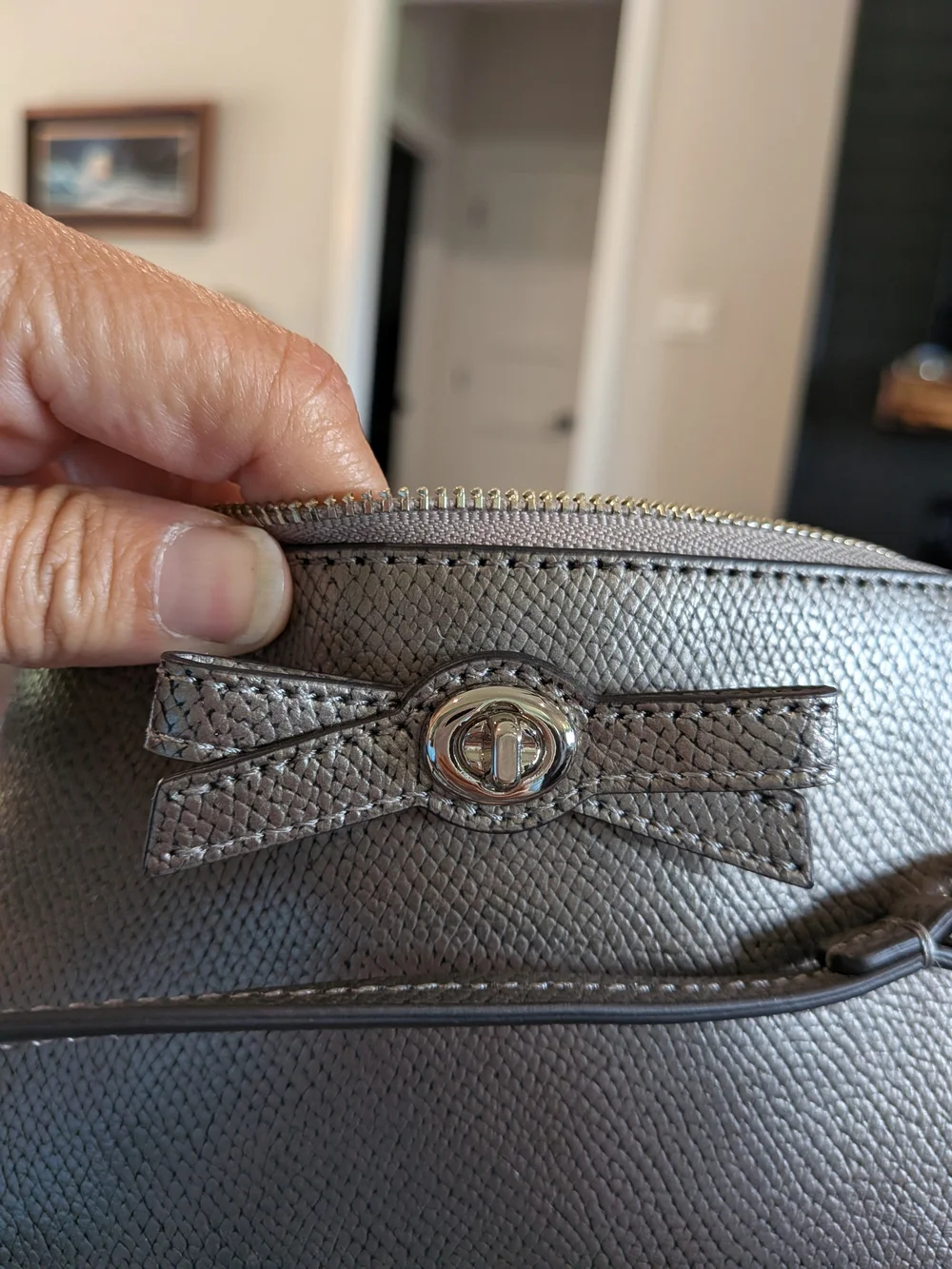 Coach Metallic Silver Bow-Accent Wristlet